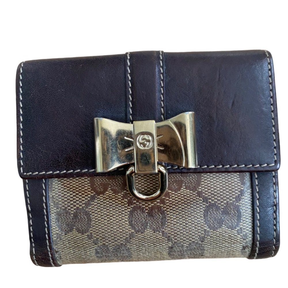 Gucci snap/bifold wallet Brown leather Gold toned hardware Coated canvas